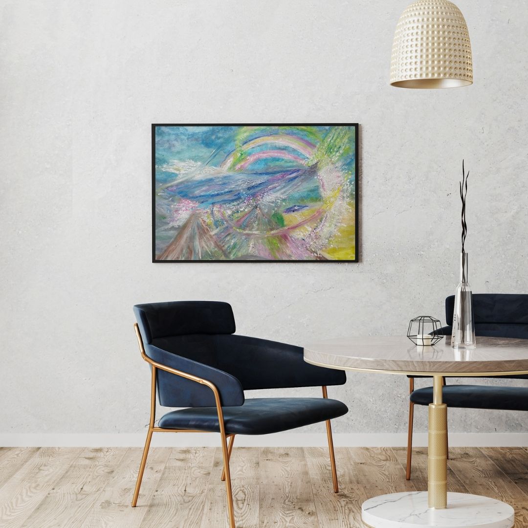 Mount Shasta artwork on a white wall, placed next to dark blue chairs, featuring a pastel-colored landscape with a spaceship and vibrant circles around the mountain.